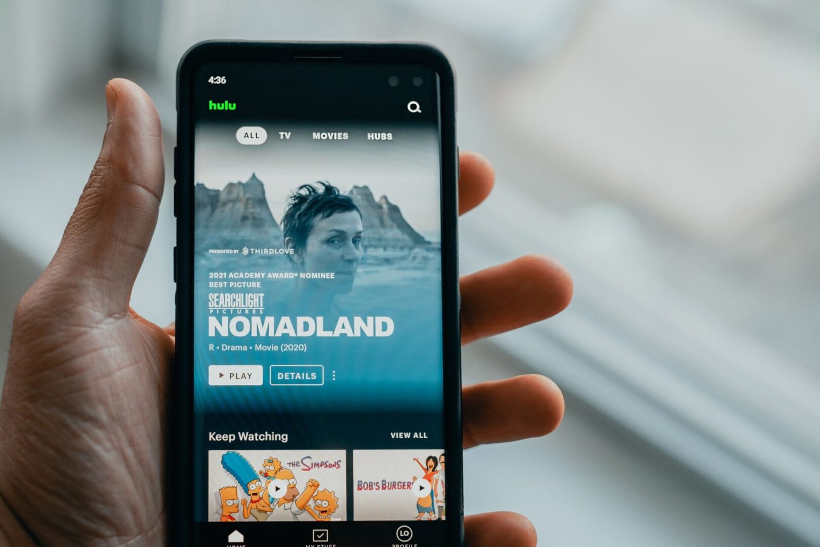 A smartphone with a Nomadland screen on the Hulu app